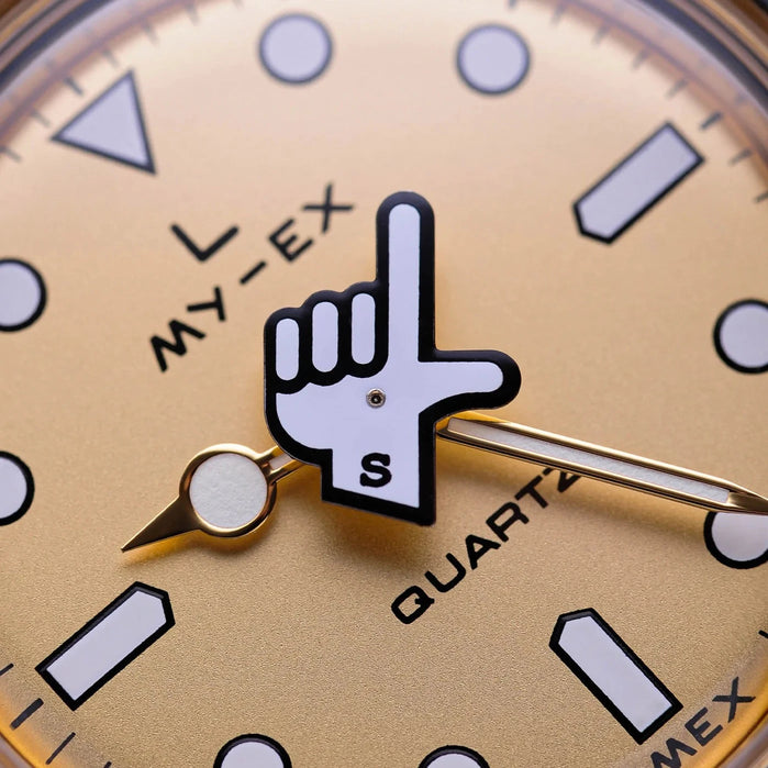 Timex x seconde/seconde/ Q 38mm Loser Gold SS angled shot picture