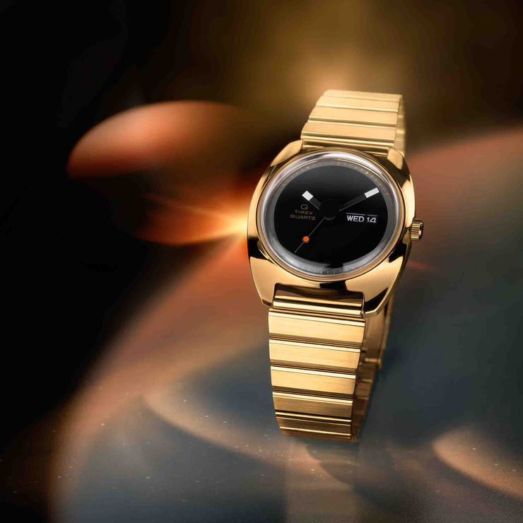 Timex Q 1975 Enigma 37mm Black Gold SS