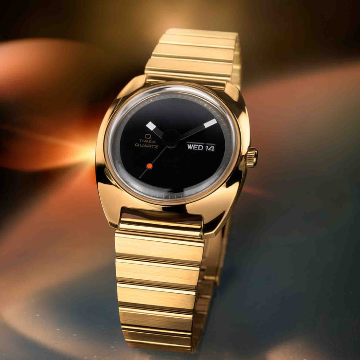 Timex Q 1975 Enigma 37mm Black Gold SS