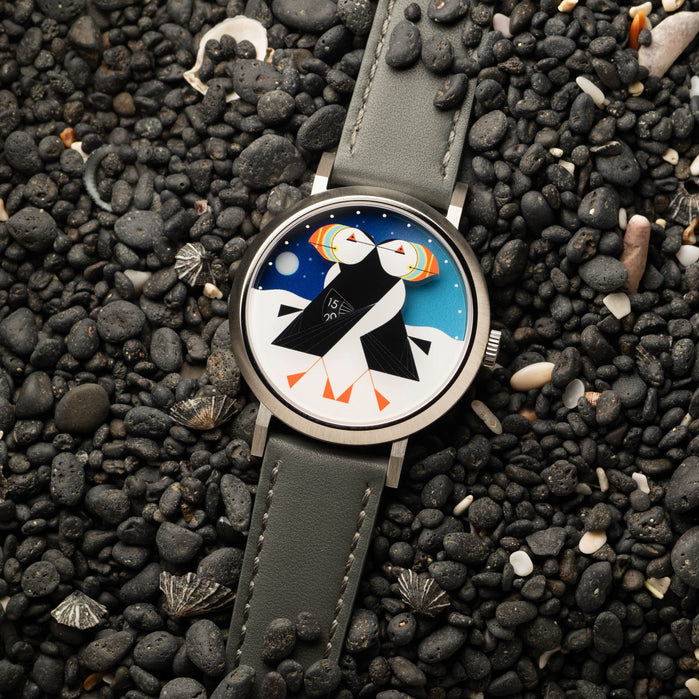 Asterisk x Charley Harper Puffins Passing Day & Night angled shot picture