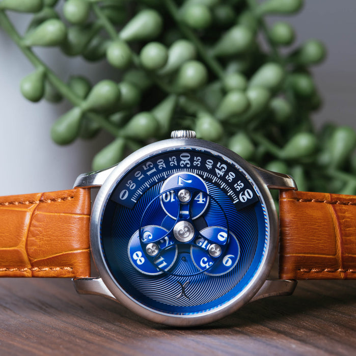 Xeric Triptych Automatic Wandering Hour Tan Blue angled shot picture