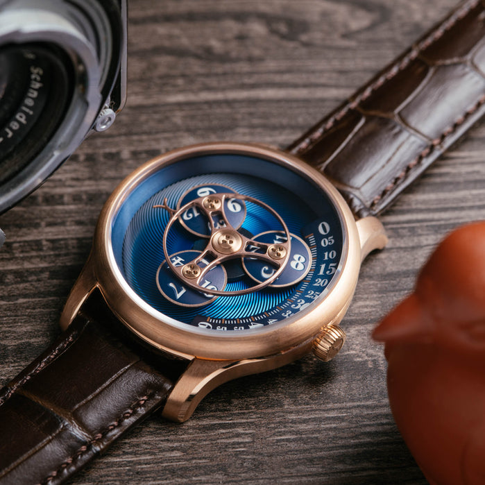Xeric Triptych Automatic Wandering Hour Rose Gold Ocean angled shot picture