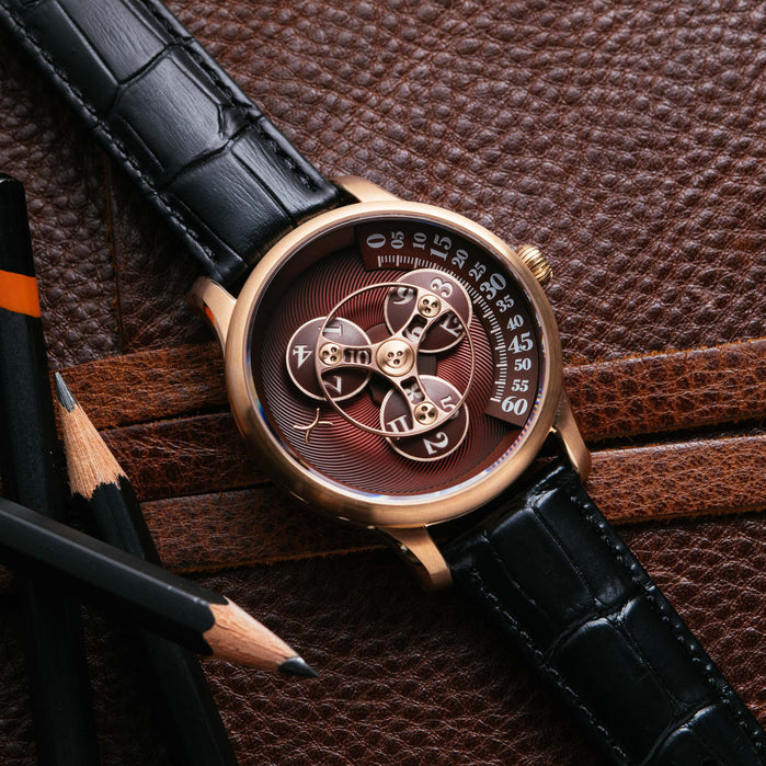 Xeric Triptych Automatic Wandering Hour Rose Gold Wine angled shot picture