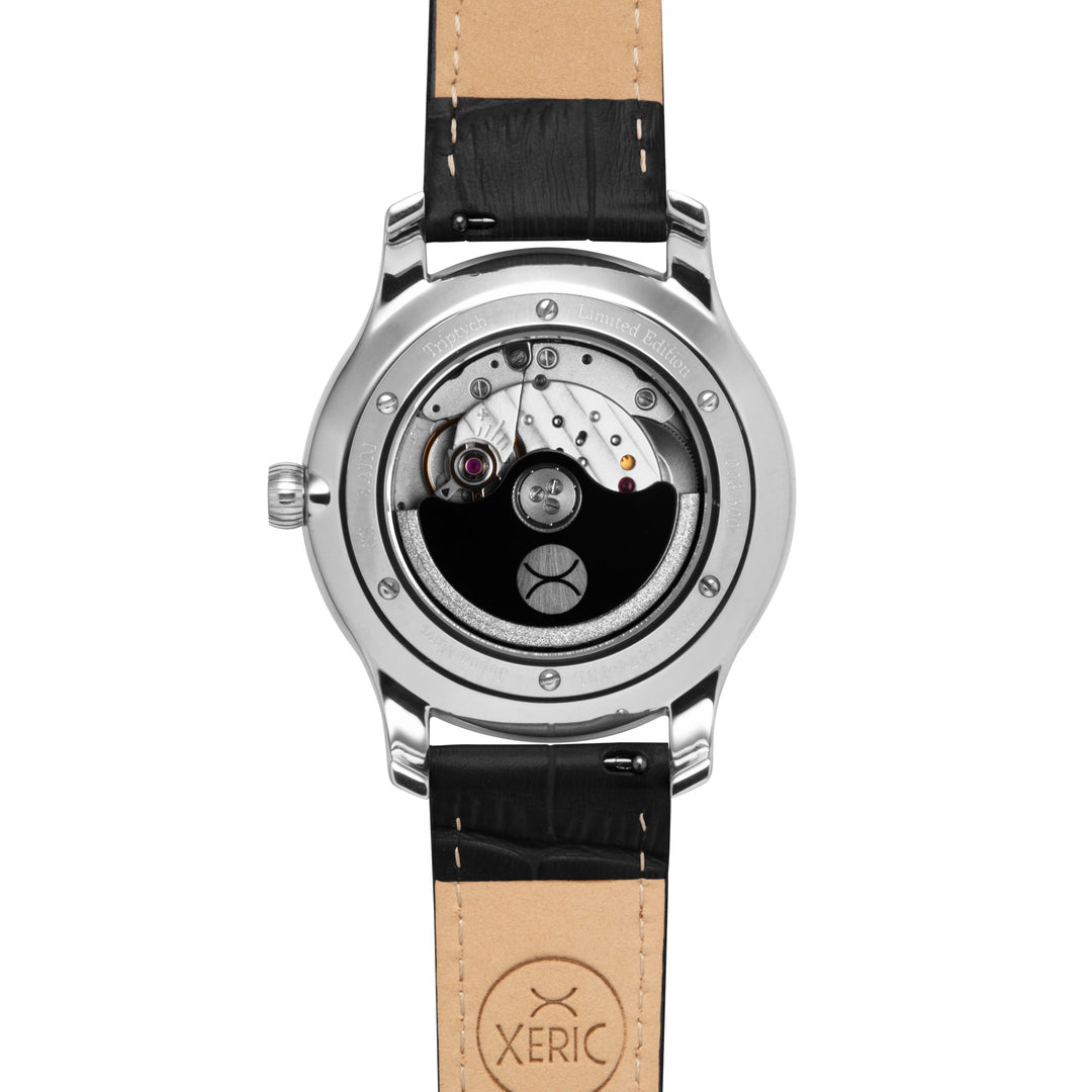 トラッチー Xeric Triptych Automatic Wandering Hour Panda | Watches.com