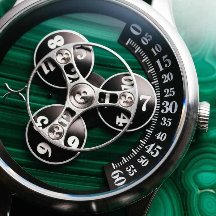 Xeric Triptych Automatic Wandering Hour Stone Edition Malachite angled shot picture